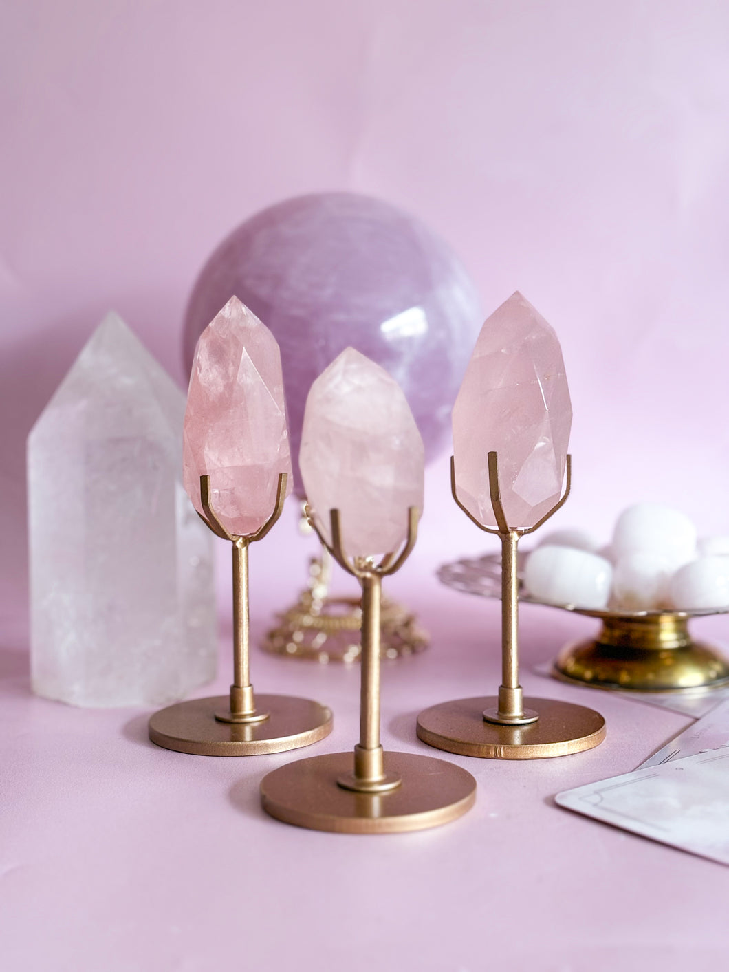 Rose Quartz Faceted Diamond on Golden Stand